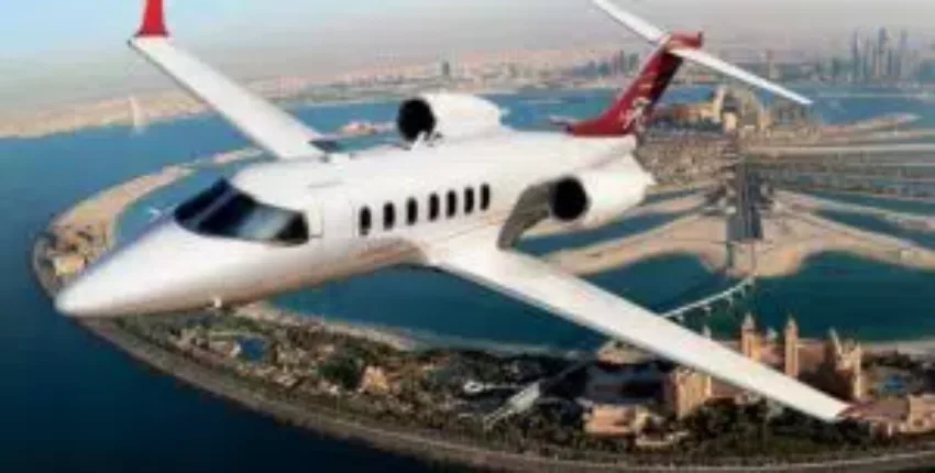 Location jet privé : Learjet 70 survolant Palm Jumeirah.